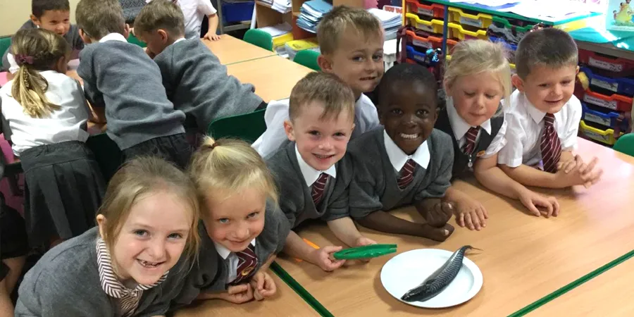 Group of happy children at the school
