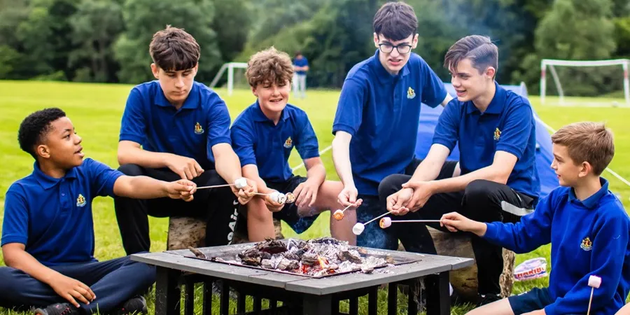 Boys roasting marshmallows