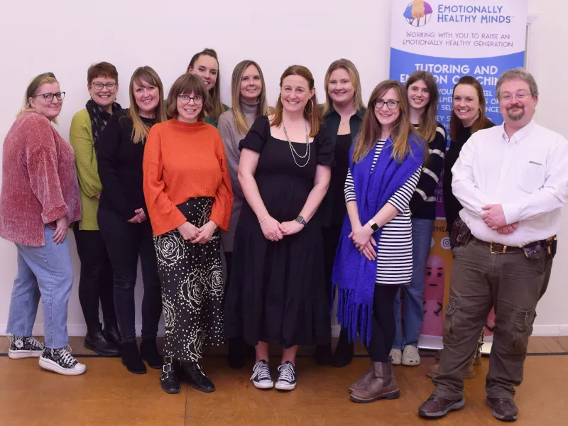 <span style="font-size:13px">Sarah (middle) and the Emotionally Healthy Minds team</span>