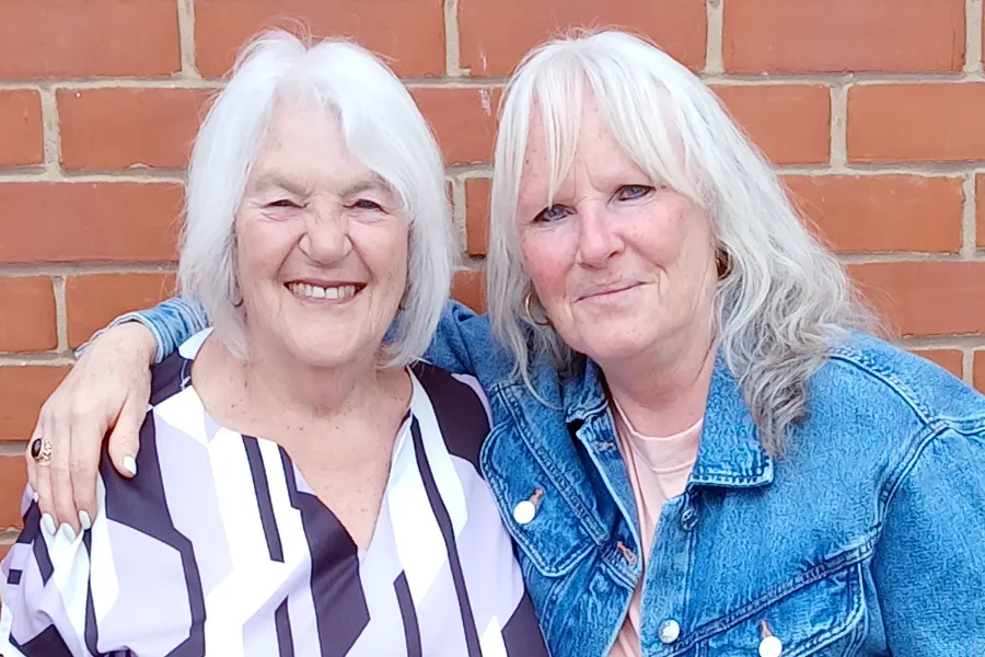 Lynn (left) is pictured here with Wendy as she collects her winnings