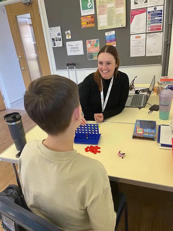 Nina and pupil enjoying their session