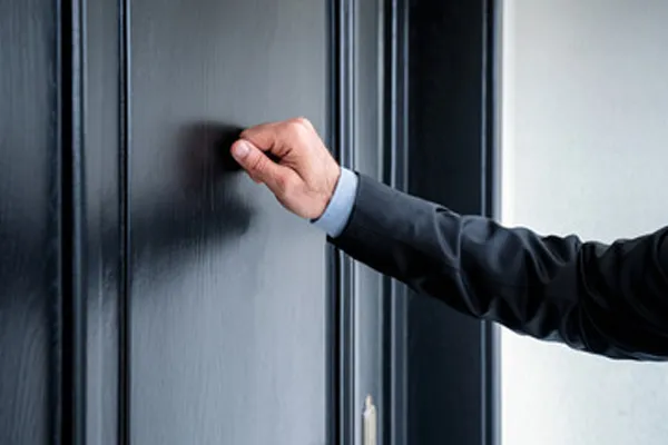 Salesman knocking at the door