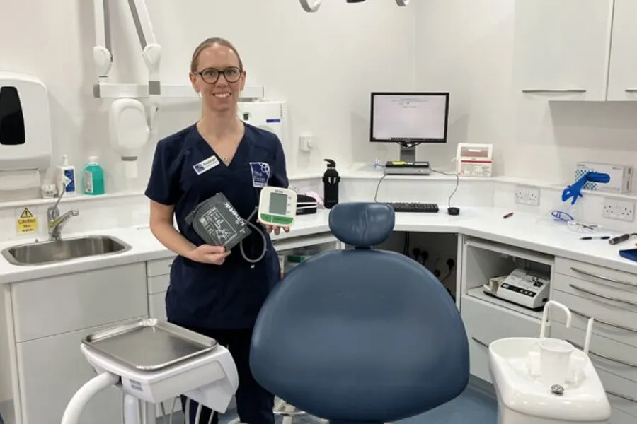 Kayleigh Gleed, Practice Manager and Dental Nurse at the Essex Dental Clinic in Earls Colne, with a blood pressure monitor that will be used in the pilot