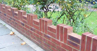 low brick boundary wall