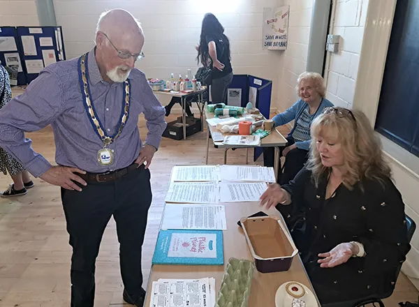 The Town Mayor, Cllr Alan Shearring browsing the displays
