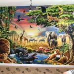 Wallpapering a wild animal scene completed
