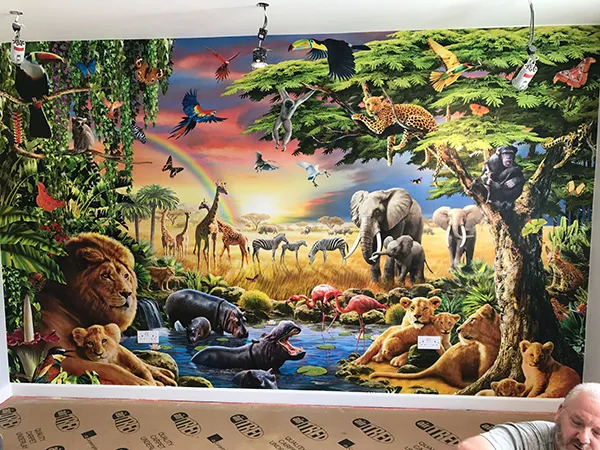 Wallpapering a wild animal scene completed