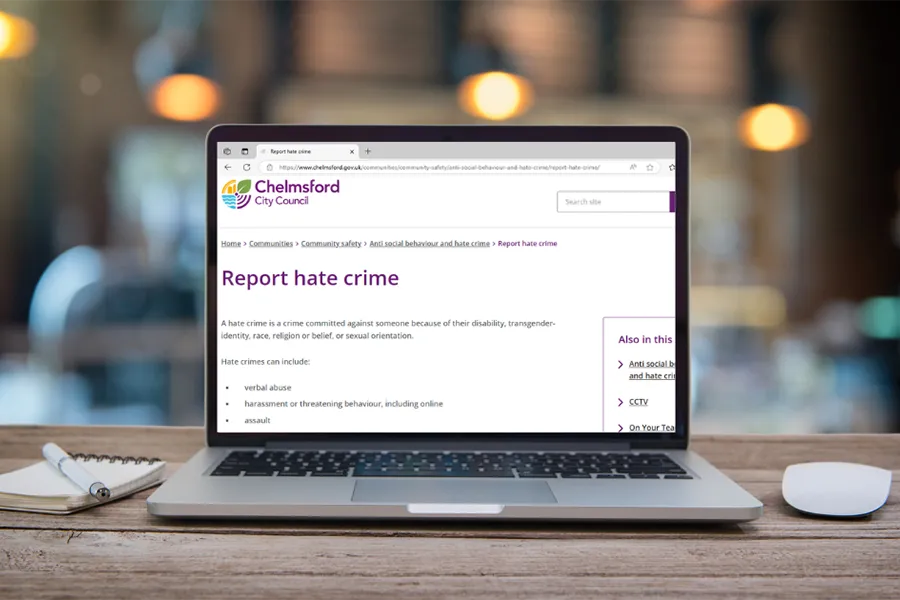 Laptop computer showing the Chelmsford Report Hate Crime web page