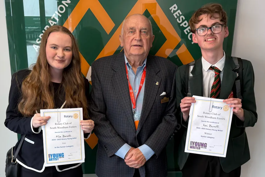 Rotary Young Artist and Young Writer winners, Mia and Kai Barnett, with Rtn Roger Gatford