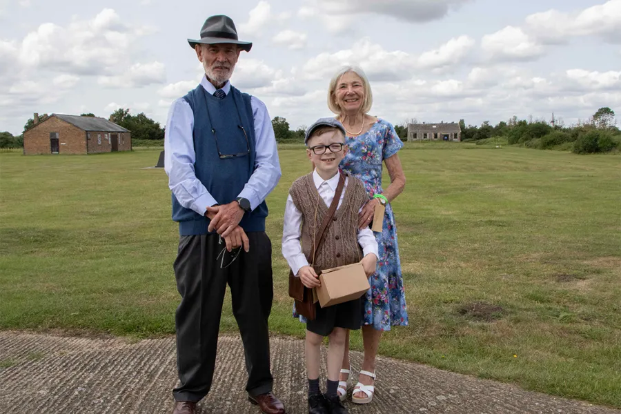 Evacuees! event at Stow Maries Great War Aerodrome - Steve and Linda Jones with grandson Stanley PIC CREDIT ETHAN HENSMAN SMGWA
