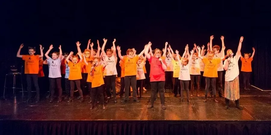 Children performing on stage