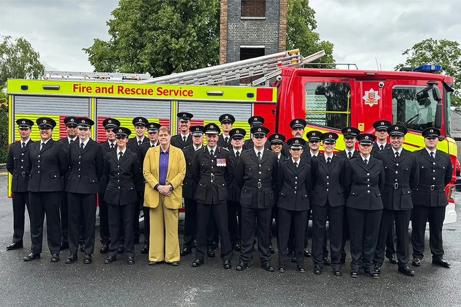 The new firefighters and control operators standing by a Fire Engine
