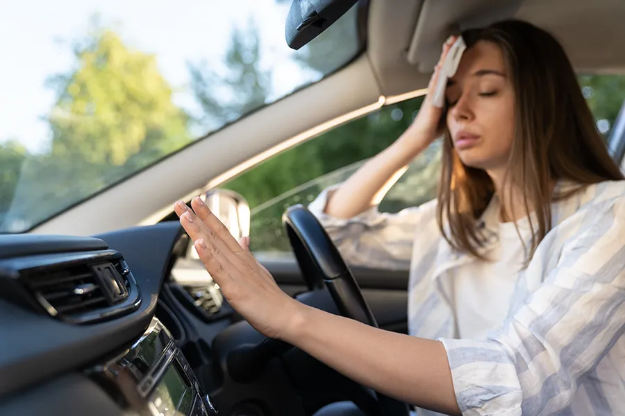 woman too hot in a car