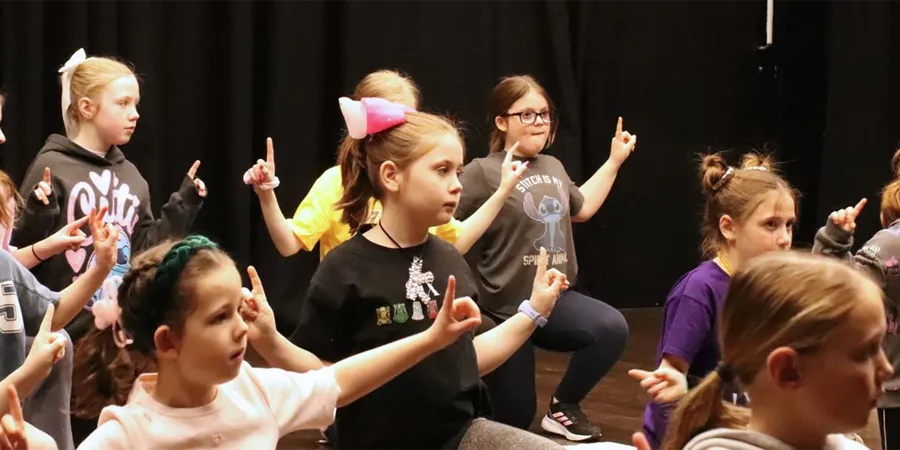 Children performing musical theatre