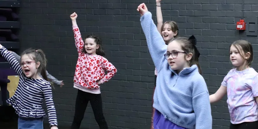 Children performing musical theatre
