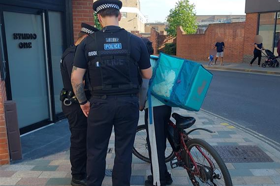 police with cyclist