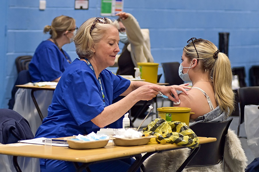 Nurse giving vaccination